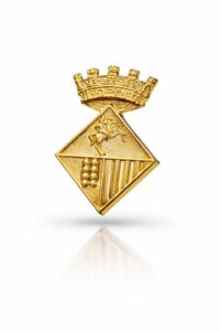 Insignia de plata con baño de oro, Serós.